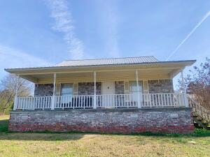 What a great buy on this brick home.  Inside you will enjoy the spacious open floor plan.  Or take it easy relaxing outside on your big covered front porch. New metal roof in 2018.THIS IS AN ESTATE SALE AND CAN NOT SELL FOR LESS THAN LIST PRICE AND IS SUBJECT TO JUDGE APPROVAL.