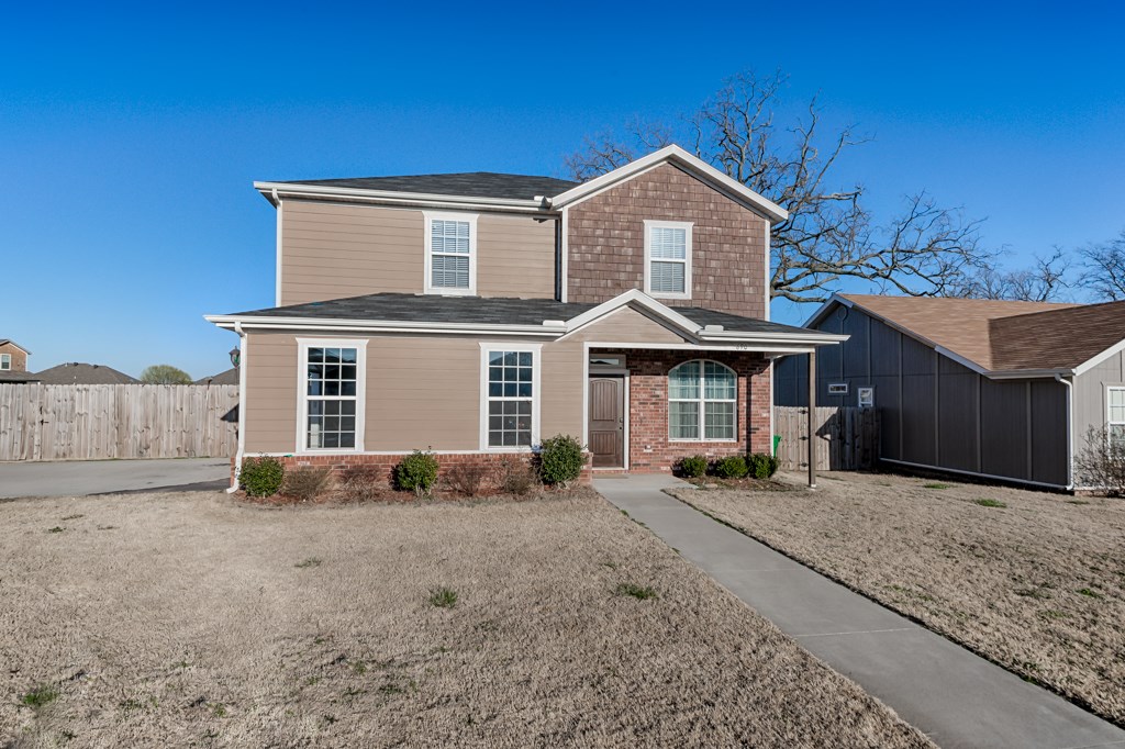 Beautiful 2 level home on corner lot with privacy fence. You will love the beautiful wood floors and crown molding in living room, dining and kitchen. Spacious 4 bedroom home with lots of storage, double vanity in master bath, spacious laundry room with lots of built-ins and a flat back yard!