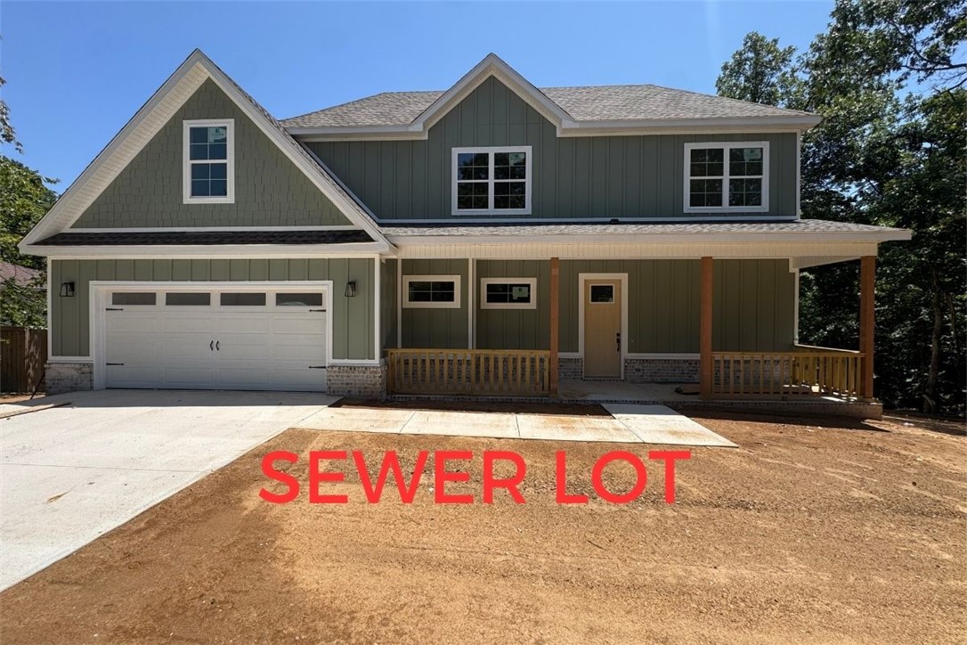 Completion date of August 25th! SEWER LOT! Discover your dream home that sits on a .31 lot just minutes away from Lake Ann & Lake Norwood! This new construction home features 3 bedrooms PLUS a flex space and 2.5 baths with the primary suite being on the main level! Step inside to find an inviting living area with an abundance of natural light, open floor plan & upgraded finishes throughout like LVP throughout (NO CARPET). The kitchen boasts quartz countertops, a large island, custom cabinets with a statement hood, a gas range, stainless steel appliances, & a large pantry. Retreat to the primary bath, showcasing a spacious walk-in shower, double vanity, & generous closet space for all your storage needs. Enjoy outdoor living on the covered back patio overlooking a sizable backyard, perfect for entertaining or relaxation. Blinds and gutters included! Don’t miss the opportunity to own this exceptional home in a vibrant community. Note, photos are not of exact home/finishes.