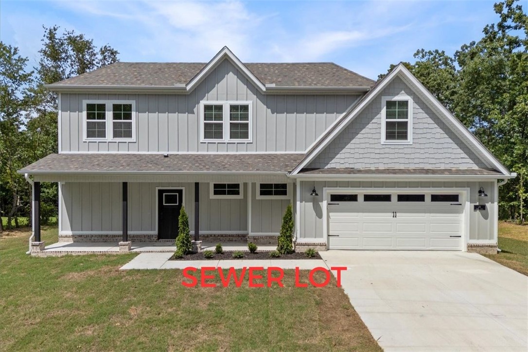 Completion date of August 25th! SEWER LOT! Discover your dream home that sits on a .31 lot just minutes away from Lake Ann & Lake Norwood! This new construction home features 3 bedrooms PLUS a flex space and 2.5 baths with the primary suite being on the main level! Step inside to find an inviting living area with an abundance of natural light, open floor plan & upgraded finishes throughout like LVP throughout (NO CARPET). The kitchen boasts quartz countertops, a large island, custom cabinets with a statement hood, a gas range, stainless steel appliances, & a large pantry. Retreat to the primary bath, showcasing a spacious walk-in shower, double vanity, & generous closet space for all your storage needs. Enjoy outdoor living on the covered back patio overlooking a sizable backyard, perfect for entertaining or relaxation. Blinds and gutters included! Don’t miss the opportunity to own this exceptional home in a vibrant community. Note, photos are not of exact home/finishes.