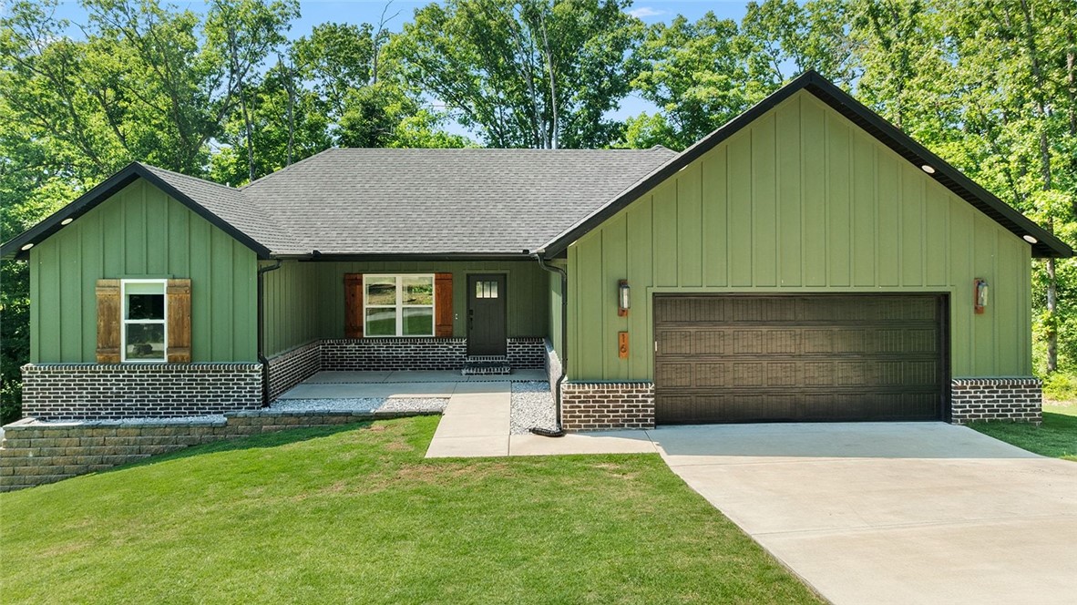 Location and style says it all!  Home features beautiful beams in the 16-foot vaulted ceiling living room, eat in kitchen, quartz countertops throughout, and engineered hardwood floors.  Kitchen has a built in microwave and wall oven, pot filler and an oversized island with space for your friends!  Master ensuite features a large soaking tub and floor to ceiling tile shower in the bath and large walk in closet.  Front and back porch have white pine ceilings and the oversized garage comes with an EV car charging plug.  All within minutes of the bike trails, lakes, golf courses. and so much more!