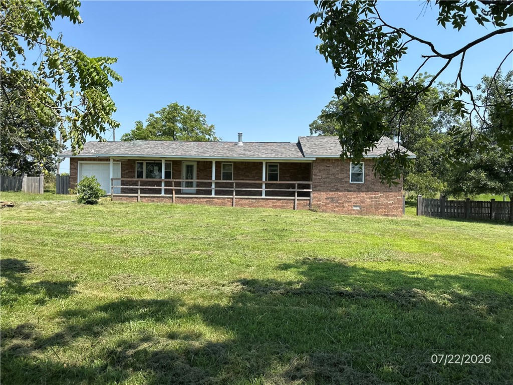Nice brick home on 10 acres that features 3 bedrooms, 2 full baths, a ready chicken coop and a fenced area ready for a few livestock until you get the rest fenced. It conveniently has city water but there is also a well. There are mature peach and walnut trees and a nice muscadine vine already in place.  There is a shed and a storm shelter outside and for your convenience a small storm shelter accessed from inside the house. This house is ready for a family to make it into a home.