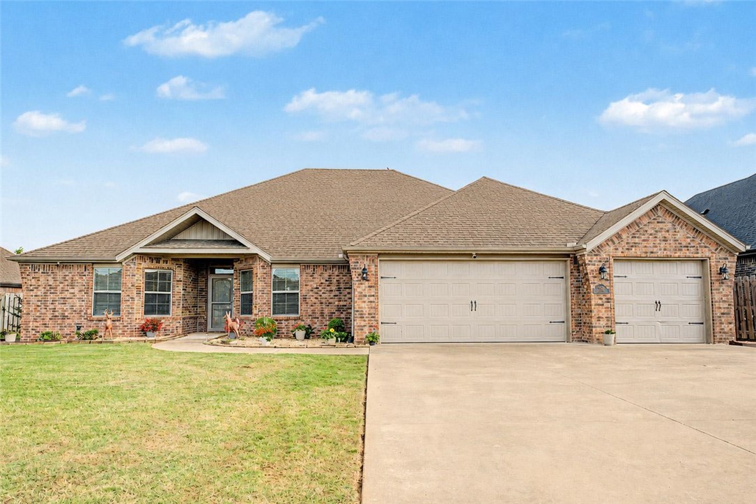 Welcome to a beautifully maintained home in a sought-after Bentonville location. The spacious living room features 10' ceilings with a cozy fireplace flows seamlessly into the kitchen, complete with granite countertops, a pantry, and ample cabinet storage options. This home offers a desirable 3-car garage, open split floor plan, large bonus room, walk-in closets, and generous attic storage. The brick exterior and energy-efficient windows enhance durability and efficiency. Additional features include an extended covered patio with pergola, new flooring with no carpet, 9' ceilings, and a utility room accessible from both the primary closet and hallway. Located in a top-rated school district with convenient access to Walmart Home Office, XNA Airport, and nearby bike trails, this home is perfectly positioned. Enjoy community amenities including pickle ball, basketball, and tennis courts. With Centerton utilities and a move-in ready condition, this is an excellent opportunity for buyers seeking a well-maintained home.