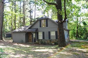 Cottage in the Country!  Leave the city behind and find your unique space in this super charming home on 1.39 acres with so much character!  Two living areas offer abundant space along with 3 bedrooms and 2 full baths.  Outside you'll find a deck overlooking the lovely back yard and a detached two car garage/shop.  That unique home you've been looking for is here waiting for your personal touch!
