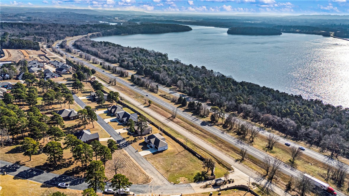 Owner Finance Available 7.5 % Interest. 
Build your dream home on this 0.33-acre cleared lot in the desirable Pleasant View Estates subdivision. This ready-to-build property offers stunning, unobstructed views of the Arkansas River and is located within a gated community, providing privacy and peace of mind. Surrounded by beautiful, mature trees, the setting is both scenic and serene. An ideal location for a custom home, this lot combines natural beauty, privacy, and convenience in one exceptional offering.