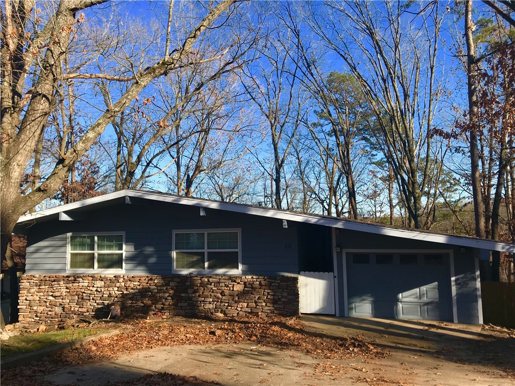 Clean, fresh, updated home. New wood laminate floors in 2017. New fence around backyard. Home was updated in 2008 which included new windows, roof, and furnace. Rooms are big enough for king size beds and furniture.  Enjoy nature from the back deck that has beautiful wooded views. House is very charming! Basement is plumbed for a second bathroom.