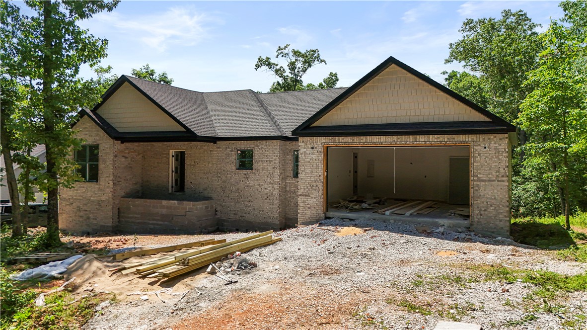 3 bedrooms plus an office with built-ins. Large open kitchen and living room with custom wood feature over the fireplace. Nice flat(ish) backyard. One year builder home warranty. Beautiful wood beams in the living room and primary bedroom. Custom tile showers and engineered hardwood in the living areas. Cabinets to the ceiling for extra storage. Plenty of linen closets and pantry, and entry way coat closet. Builder concessions of up to 10K for closing costs, rate buy down or upgrades like a fence or wood floors in the bedrooms.
