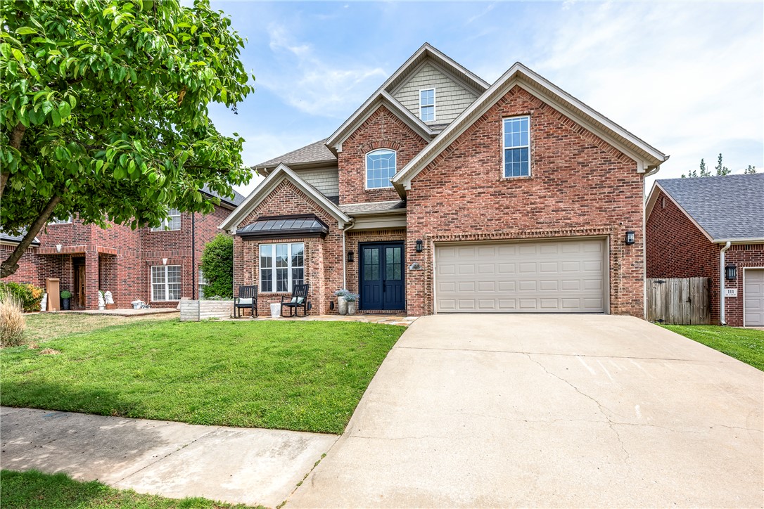 Walk to everything Bentonville is known for -- the Downtown Square and the Walmart home office to Crystal Bridges, The Momentary, 8th Street Market, trails, dining and entertainment -- while enjoying the privacy of a quiet, tucked-away corner in one of downtown’s most desirable neighborhoods. Completely reimagined in 2023, 109 SE G Court offers over 3,000 square feet of refined, move-in-ready living with 4 bedrooms and 4 baths. Thoughtfully redesigned with elevated finishes throughout, the home blends modern style with everyday comfort. The chef’s kitchen features striking Dolomite countertops, updated cabinetry and an open layout designed for entertaining. A spa-inspired primary suite with a luxurious wet room creates a true retreat, while fresh paint, new carpet and designer fixtures bring a polished feel to every space. Rarely does a home offer this level of walkability, privacy and turnkey luxury in the heart of Downtown Bentonville!