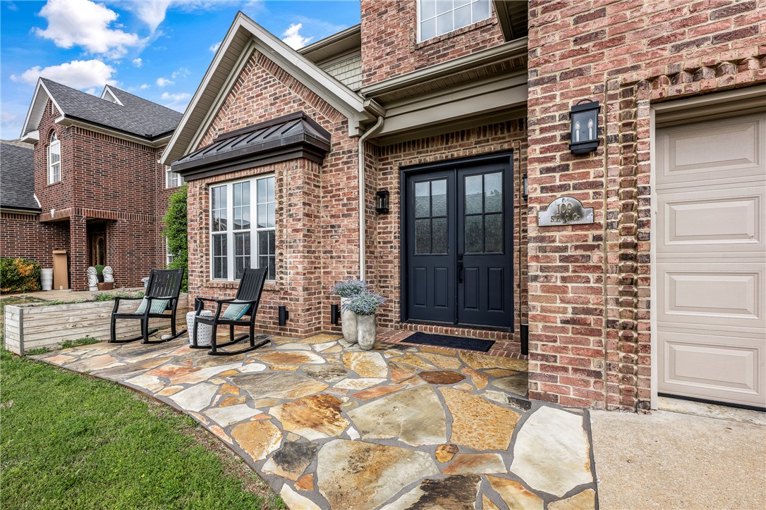 Walk to everything Bentonville is known for -- the Downtown Square and the Walmart home office to Crystal Bridges, The Momentary, 8th Street Market, trails, dining and entertainment -- while enjoying the privacy of a quiet, tucked-away corner in one of downtown’s most desirable neighborhoods. Completely reimagined in 2023, 109 SE G Court offers over 3,000 square feet of refined, move-in-ready living with 4 bedrooms and 4 baths. Thoughtfully redesigned with elevated finishes throughout, the home blends modern style with everyday comfort. The chef’s kitchen features striking Dolomite countertops, updated cabinetry and an open layout designed for entertaining. A spa-inspired primary suite with a luxurious wet room creates a true retreat, while fresh paint, new carpet and designer fixtures bring a polished feel to every space. Rarely does a home offer this level of walkability, privacy and turnkey luxury in the heart of Downtown Bentonville!