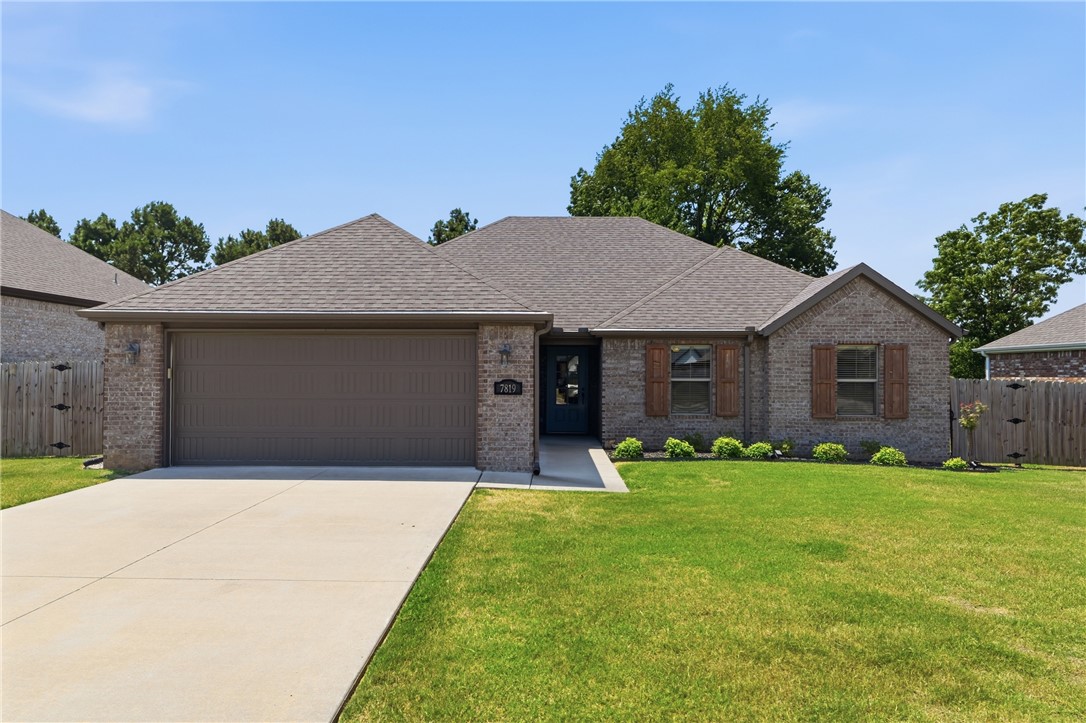 Centrally located to ALL of NWA. Convenient access to Shaw park and award winning Springdale schools. This immaculately kept home is move in ready with a warm and inviting atmosphere featuring wood floors and a vaulted living room ceiling with beautiful stained beams. A thoughtfully designed primary suite offering his and hers closets with a nice tiled shower and soaking jetted tub. A chef's kitchen with a nice gas range and the French door refrigerator conveys. Great garage wall organization system with a door to your private backyard. This charming home combines comfort, all the amenities you could want, all in an exceptional location! Come out to see for yourself Today!