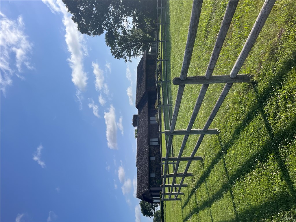 Discover the potential of this spacious 2,600-square-foot home on approximately 4 acres, with the option to purchase additional acreage. With 3 bedrooms and 3 full bathrooms, this property is perfect for those seeking country living with room to grow.
Inside, an enclosed sunroom with its own heating and cooling system, and an unfinished basement ready to be transformed into additional living space. While the home is ready for your personal updates and touches, it offers endless possibilities to truly make it your own.
Step outside to enjoy deck, covered patio, and a refreshing 4-foot-deep inground pool. The property also has a large hay barn and a spacious shop building.
Take in the beautiful countryside views- this property offers a blend of peaceful rural living and practical amenities. Whether you're dreaming of a hobby farm, a place to spread out, or simply enjoying the tranquility of country life close to town, this property is ready to welcome you home.
More photos coming soon!