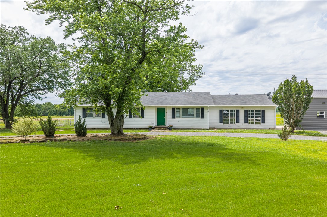 Enjoy peaceful country living outside of Lavaca on approximately 0.80 acres! t\This spacious 4 bedroom and 2 1/2 bath with a bonus room offers on open-concept layout with plenty of room to spread out.  Step out back onto the deck and take in beautiful evening sunsets.  A standout feature is the impressive 1,200 sq. ft. shop, built just 2 years ago, featuring a 6" concrete slab designed to accommodate heavier vehicles. The shop includes two 10' X 10' overhead doors, 12' sidewalls with a 16' center height, and loft space for additional storage-perfect for vehicles, equipment, or hobbies.  The property also offers excellent parking with a convenient circle drive, making access easy for guests, trailers, or larger vehicles.  This is a rare opportunity to own a versatile property with both comfortable living space and a high quality shop.