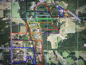 Tract #5. Each tract is numbered and each border of property is tapped off and outlined in the color on the map. This tract is ORANGE. 7 beautiful acres with stunning views just north of Lamar city limits on Highway 123 in Lamar.  Utilities at road. Covenants apply. Vacant land. Give us a call/text with any questions or for your personal tour.