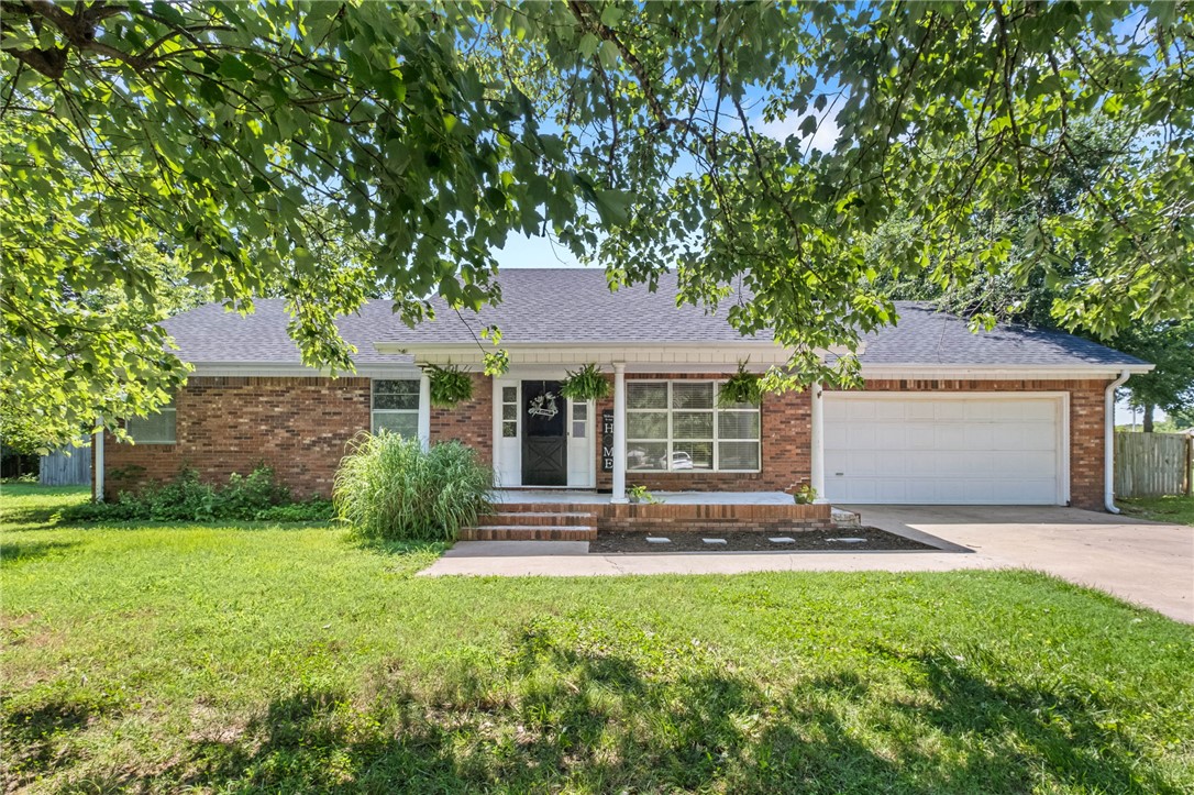 Professional photos will be added on Monday, July 13th.

Welcome to this 3-bedroom, 2-bath brick home located on a spacious 0.60-acre lot in Pea Ridge. Enjoy the large, tree-shaded yard with plenty of room for outdoor activities, gardening, or entertaining. Inside, you'll find new carpet in all bedrooms, providing a fresh, updated feel. The home also features a 2-car garage and a new roof installed in 2024 for added peace of mind. Conveniently located with easy access to local amenities, this property offers a wonderful opportunity to make it your own. Home is being sold AS IS, and the seller will make no repairs.