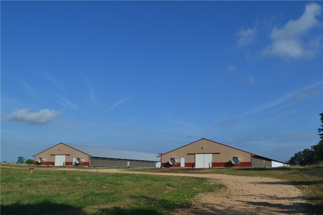 Nearly new 2 mega house broiler farm ready to go with room for more. Built in 2016 on 75 acres with a 3 bedroom 2 bath rock home. Poultry are on well with rural water back up. Over sized well house ready for expansion.