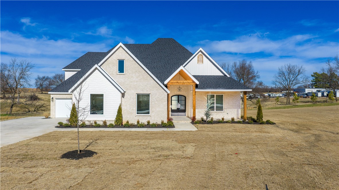 New construction on 1.3 acres featuring 4 bedrooms, 3.5 baths, plus office and bonus room. Stunning kitchen with double islands, 6-burner gas cooktop, double ovens, built-in refrigerator, and open flow to the living and breakfast areas. Spacious living room offers a gas fireplace with built-ins and large sliding doors to the covered patio. Primary suite features vaulted ceiling, dual vanities, walk-in closet with built-ins, oversized walk-in shower, and soaking tub. 3-car garage with epoxy floors.