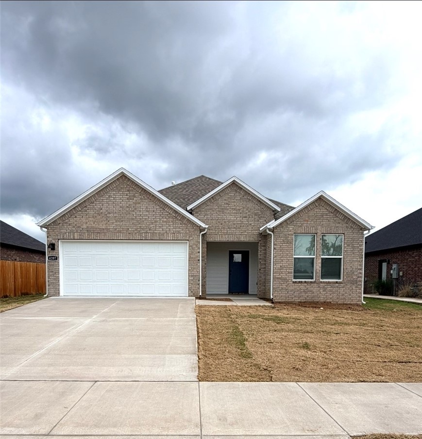 Sold before print! Delightful Denton Plan in Brentwood Village, located in Springdale, close to the C.L. "Charlie" and Willie George Park that consists of walking trails, dog park, splash pad, ball fields, and tennis courts close to the Don Tyson Parkway, near the highly sought-after Don Tyson School of Innovation and other schools. These brand-new homes will be 4-sided Brick! Living room will showcase a beautiful and modern Electric Fireplace with Poplar Mantle. Home will have LVP and Carpet. Kitchen will have 42-inch cabinets, lovely appliances and quartz countertops and tile backsplash. Ceiling fans in Bedroom one and the living room. Primary bedroom has a fabulous ensuite with an oversized walk-in shower and elongated commode. LED lighting throughout. High efficiency AC with programmable thermostat. Come find your dream home today! Taxes and Parcel TBD.