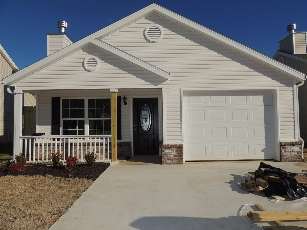 Charming home on a cul-de-sac backing up to 50 acre Veterans Park. All electric utilities with wood laminate flooring, granite tops in kitchen and bathrooms, stainless appliances, and wood burning fireplace. Lots of curb appeal with its siding and brick,facade, plus landscaped and sodded front yard. Privacy fence between front and back yard. Separate dining area and living room with vaulted ceiling for extra style. Energy efficient and low maintenance. Down payment assistance programs available!