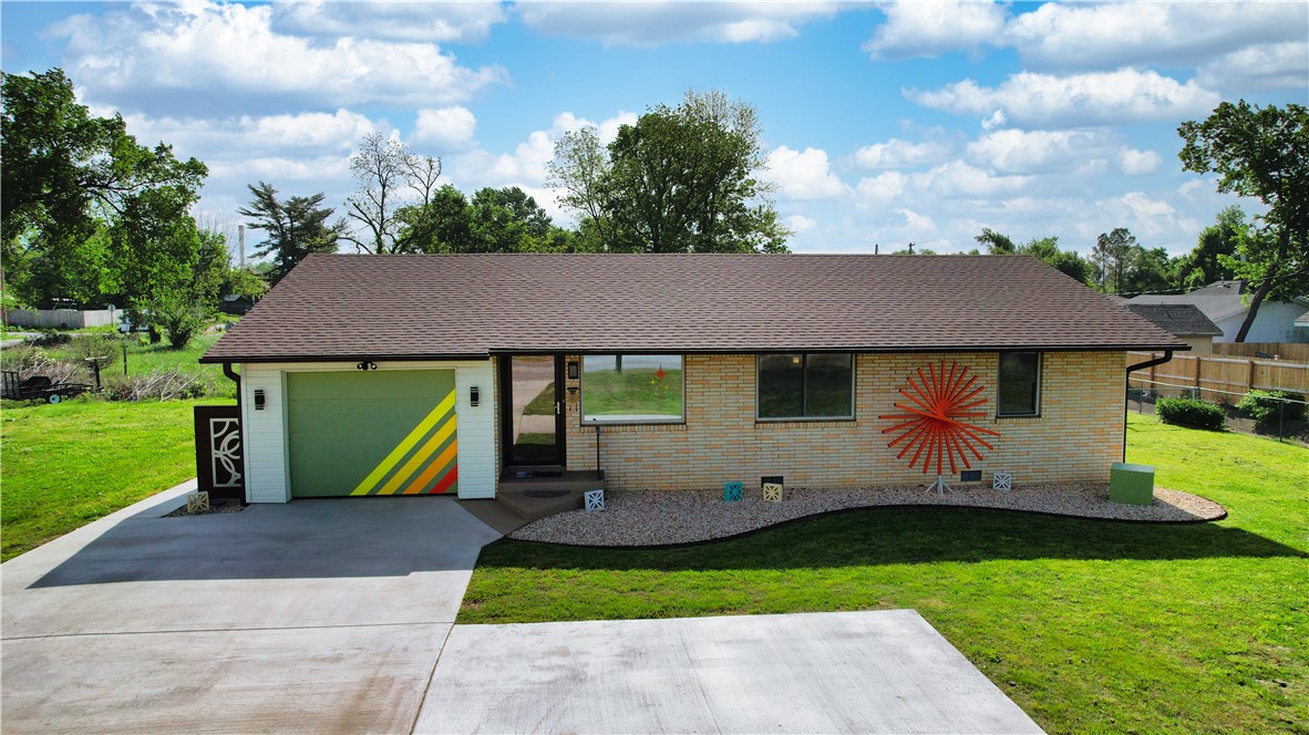 Charm in abundance in this fully renovated home that beautifully honors its Mid-Century Modern roots. Ideally located if you want the downtown Rogers lifestyle, easy access to local trails, Lake Atalanta, and nearby Rogers High School all while coming home to a truly turnkey property. Every detail reflects thoughtful design and passion with custom details and carefully curated period-inspired elements and high-quality finishes throughout. The result is a seamless blend of vintage character and modern comfort. The home offers 3 bedrooms and 2 full baths, featuring cedar-lined closets, custom handrails, ceramic tint on west-facing windows, new roof and a new HVAC system. Step outside to a family-friendly backyard complete with storage, a charming vintage clothesline, and a beautiful fire pit with ample seating. With its distinctive style this property also presents an excellent opportunity as a short-term rental. Furnishings and decor are negotiable, offering a true turnkey investment or personal retreat.