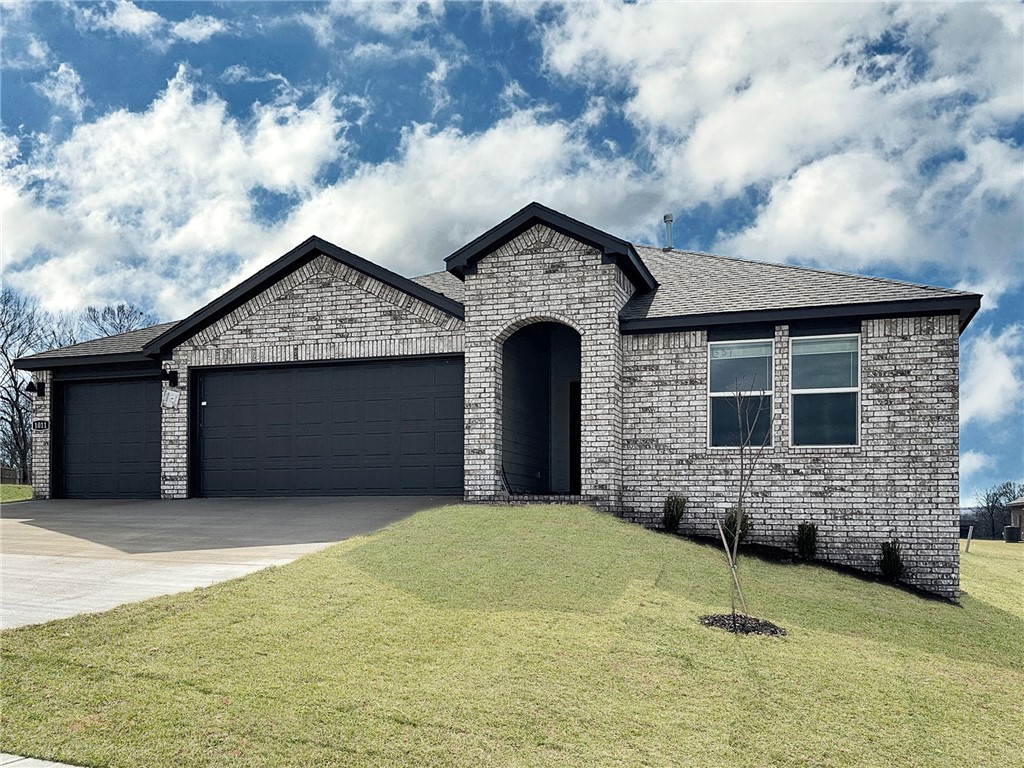 Lovely Kingston plan. Find your new home in Northwest Arkansas in Hudson Heights in Prairie Grove. These homes have fabulous features for comfortable, modern living. Each home features LVP flooring throughout! The living room features a beautiful electric fireplace with a poplar mantle! Kitchens have Quartz countertops, stainless steel appliances, and a stainless steel undermount kitchen sink with a pull-out faucet! Bedroom one with en-suite will feature a ceiling fan, quartz counters with dual sinks, oversized Walk in Shower and a walk-in closet. Home will be 4-sided brick with Hardie Siding per plan!  Covered patio (per plan) Taxes and Parcel TBD.