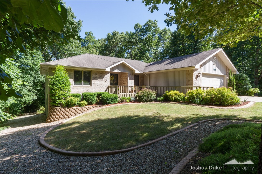 If you are looking for a secluded, park-like setting on an acre, this is IT!  Custom-built home with lots of natural light and serene heated and cooled sunroom.  340 sq ft of heated / cooled space in basement (with 1/2 bath)  is NOT included in the sq ftg.  This is bonus space to use as you wish.  2 outbuildings, matching stainless appliances less than 3 yrs old, back deck has remote controlled sunshade, home is plumbed for central vac only, lots of storage, surround sound in media room downstairs.