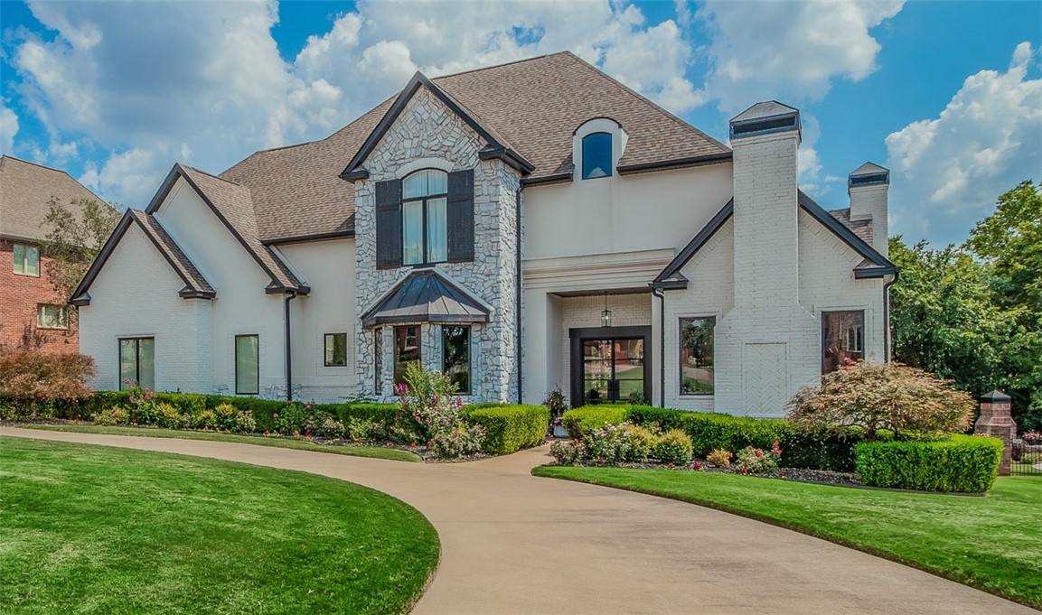 Nestled on a sprawling, tree-lined lot, this beautifully updated 4-bedroom, 3.5-bath home epitomizes modern elegance within the gated Pinnacle subdivision. Designed to harmonize style and function, the first floor boasts an open-concept living and dining area graced with soaring ceilings, abundant natural light, custom built-ins, wooden beams, and a cozy fireplace. The chef's kitchen is a culinary dream, featuring a stunning waterfall quartz island, custom white oak cabinetry, premium appliances, and a walk-in pantry. The primary suite presents a spa-like ensuite with a double shower, soaking tub, dual vanities, an additional makeup vanity, and an expansive closet. An office with large windows and a media room equipped with a fireplace and wine bar add to the home's allure. Upstairs, three spacious bedrooms and a dedicated play area/flex space offer versatility and ample storage. Enjoy ultimate privacy in the tranquil backyard, perfect for entertaining or designing a custom pool. Agent owned.