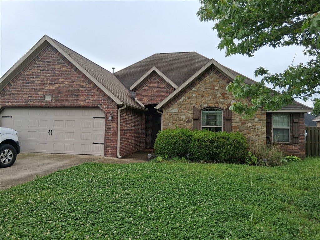 Three bedroom, two bath home in Bentonville offering comfortable, practical living. The layout includes three bedrooms and two full bathrooms, plus a two-car garage for covered parking and storage. A fenced-in yard provides a private outdoor space for recreation or gardening. Conveniently situated in Bentonville, this home combines straightforward functionality with outdoor convenience.