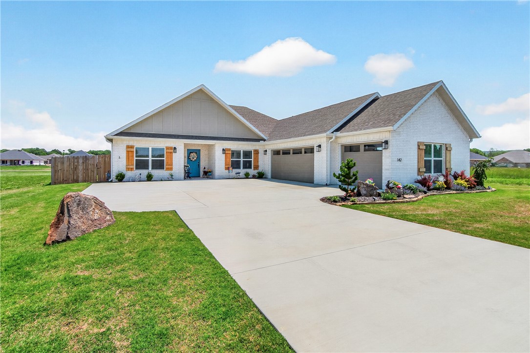 Welcome to this beautifully maintained 4-bedroom, 2.5-bath home with a 3-car side entry garage, offering the perfect combination of style, comfort, storage, and convenience. Designed with a desirable split floor plan, this like-new home features soaring cathedral ceilings and spacious living areas filled with natural light and wood look tile throughout. The private primary suite is a true retreat, complete with a walk-in closet and a spa-like bathroom. The inviting living room also includes a gas fireplace, creating the perfect space for relaxing or entertaining guests. The kitchen showcases elegant granite countertops, ample cabinetry, and easy access pantry.  Step outside to a covered patio and a generously sized backyard with a wood privacy fence, ideal for outdoor gatherings, pets, or play. Conveniently located within walking distance to Farmington Creekside Park and just minutes from top-rated schools, shopping, and dining.  Many upgrades you wont see in nearby homes.  All applliances convey!