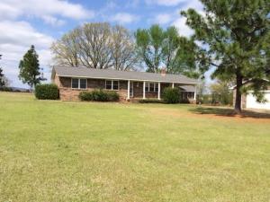 Very nice home on 4.33 ac. priced to sell. All appliances are included, Brick wall and set up for free standing wood stove in LR.  Home features new roof in 2013, new vinyl windows, 3 bedroom, 1 lg bath with space for additional 1/2 bath. Home is well maintained, includes metal shop building, tractor shed.