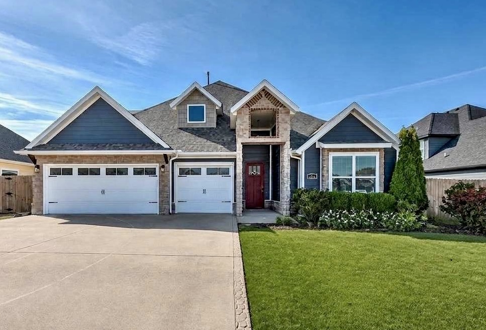 Meticulously cared for, exceptionally clean, and truly move-in ready, this craftsman home delivers solid value & layout that works for everyday living. Highlights include: Large rooms, exposed beams, huge closets, craftsman staircase, open floor plan, media room. Features include granite countertops, like-new kitchen appliances, central vacuum, custom blinds, and a well-organized laundry room w/ drop zone. Storage is abundant w/ attic space, a large 3-car garage/workshop,   and insulated outdoor storage area with custom built-ins. 4-bed, 3-bath layout includes a comfortable primary en-suite retreat. Outside, a covered patio and a larger backyard than nearby new-construction lots offer room to relax & play. At eight years old, the home has already proven its durability—and the brand-new roof installed after a 2025 hailstorm is a major buyer benefit. Located in a friendly neighborhood with quick access to I-49 and a smooth 15-minute drive to Walmart HQ, plus walking distance to Gamble Elementary and Bentonville West.