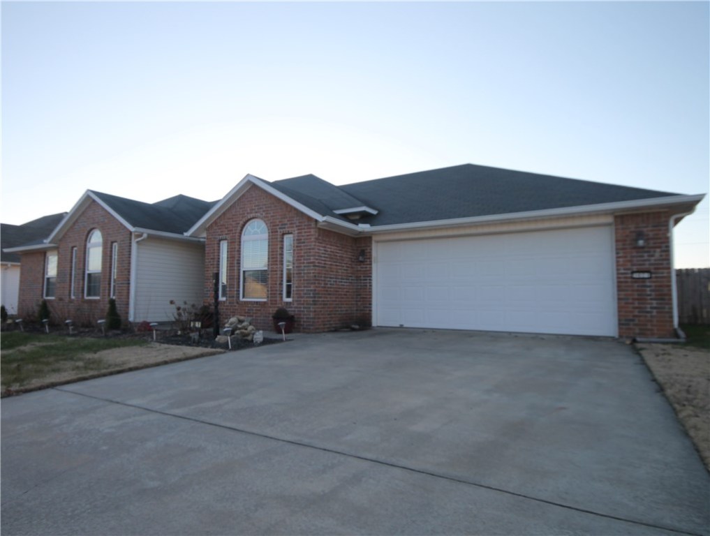 Extremely well maintained and updated home within a few steps of Holcomb Elementary. 3 bedroom and 2 full baths with formal dining as well as eat-in-kitchen. Owners currently use formal dining as office space. Laundry includes washer/dryer. Full brick exterior with privacy fenced backyard. Nice over-sized patio for entertaining. Easy commute to I-49, University of Arkansas, as well as shopping and dining. This is a hard to find gem so bring your buyers. They will thank you.