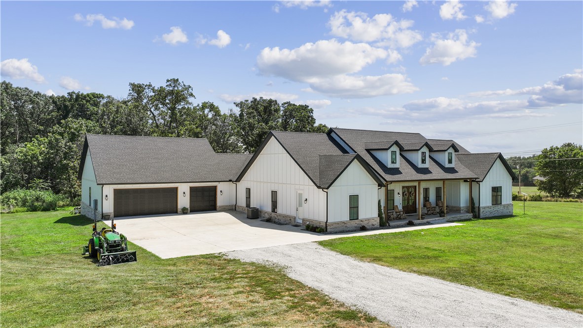 Farm Style Dream Home! Lovely front porch to relax. Open plan with all you could want! Primary bedroom with huge closest and bath. Second large bedroom with it's own bath. Two bedrooms with a shared jack n jill bath, on the opposite side of the home. HUGE game room/ media room/ office, BIG walk in pantry and luxury laundry space with work area, and sink. Storage galore! THIS GARAGE THOUGH! WOW! This garage holds 6 vehicles! AH-Mazing! The back patio is accessable from many exterior wood doors. Designed for a pool, the half bath has a door from the patio. You just have to see this one for yourself!