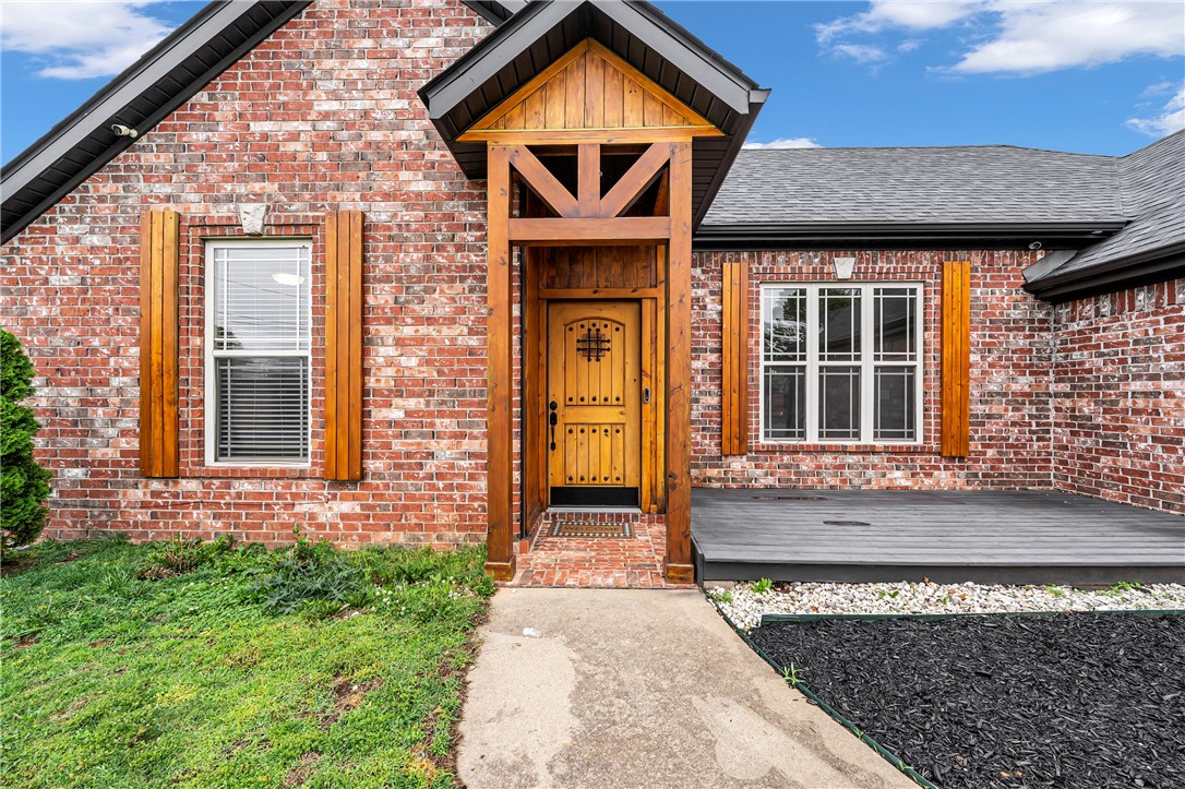 You guys, you need to see this! This adorable 4-bedroom, 2-bath brick home in Springdale's Westfield neighborhood is literally perfect if you commute anywhere in NW Arkansas. You're right off I-49, so getting to Bentonville, Rogers, or Fayetteville is a breeze — no more stressing about drive time! The neighborhood is established and so well-kept, with great schools nearby and everything you need just minutes away. Inside, the split floor plan gives everyone their own space, the gas fireplace is cozy, and the wood floors are gorgeous. The kitchen flows right into the dining room, which you know you needed for hosting! The primary suite has a huge walk-in closet, and there's even a bonus room for a home office. The backyard is fenced and private — perfect for your dogs. Seriously, 1,627 square feet, a 2-car garage, and all of this for $355,000. In THIS market? You won't believe it. Come see it — you'll want to make an offer on the spot!