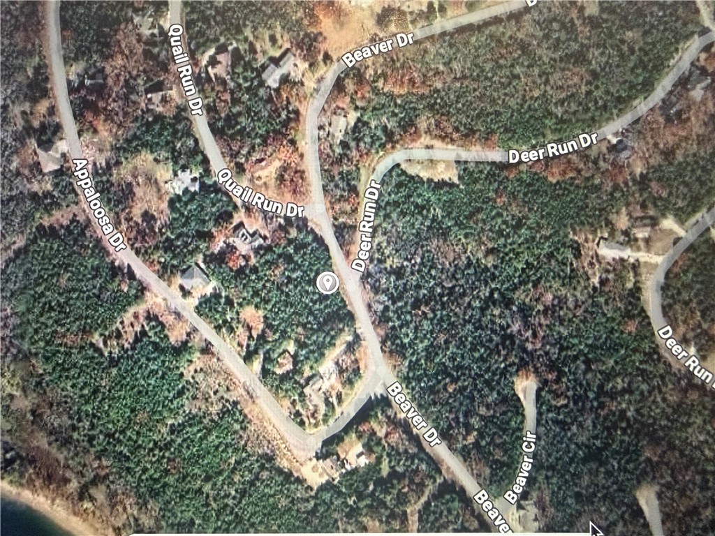 Pictures cannot show what this lot has to offer. This Property is located at the top of the Island. Gentle upward facing slope for great views . 120 feet of road frontage with fantastic views. Great place to build your dream home!