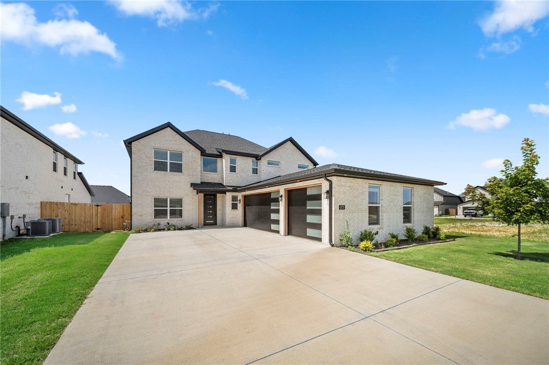 This beautifully crafted custom home showcases modern finishes throughout, featuring a stunning tiled accent fireplace, an oversized island, and abundant storage space. Designed for both comfort and functionality, the home offers two dedicated office spaces—one on the main level and another upstairs—perfect for working from home or flexible living. All bathrooms feature fully tiled showers, while additional upgrades include an EV charging port and a gas line for outdoor grilling. The extended-size 3-car garage provides ample space for vehicles, storage.

Enjoy the spacious, flat oversized backyard, ideal for entertaining, The expansive media room comes complete with media equipment valued at approximately $6,000, making it move-in ready for your ultimate home theater experience.
Ideally located within walking distance of Bentonville schools and offering convenient access to I-49, Walmart Home Office campuses, and downtown Bentonville, this home combines modern luxury, functionality, and an unbeatable location.