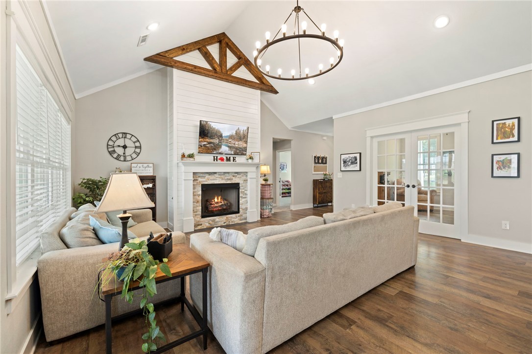 Have you been waiting for the PERFECT house to hit the market? This home is THE ONE. 4 bedrooms AND a designated office, 3 full bathrooms (2 ensuites!), large living area with cathedral ceilings, exceptional sized kitchen, pantry, & dining, hand carved wood details, & tons of room indoor and out! Located on a large corner lot with a side set garage, this home has a fully fenced, huge, level backyard complete with covered & uncovered patio space, a permanent hard sided above ground pool, & room to play and entertain. The curb appeal is second to none & is located in the most popular area of Prairie Grove (Snyder Grove!) - within walking distance to ball fields, aquatic center, skate park, shops, restaurants, schools, & entertainment. Close to highway 62 for easy travel to Fayetteville or anything NWA. The community of Snyder Grove is family oriented & driven - quite literally straight out of a movie, you'd have to see it to believe it! This is your opportunity to get into a growing community and in a wonderful home!