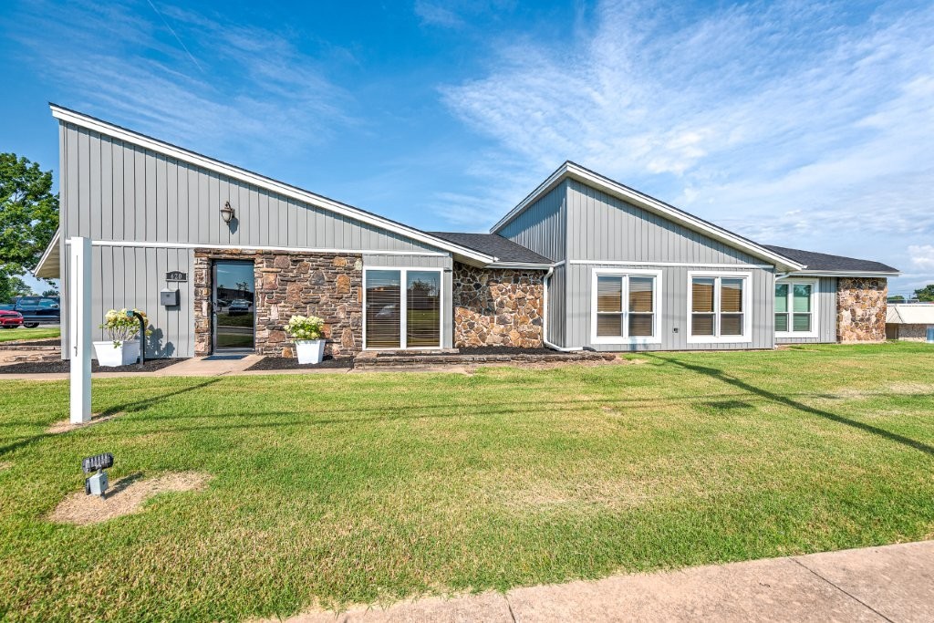 Building has new roof, new siding, new windows, new flooring and new HVAC system. Ideal for various types of medical facilities. Lots of parking, large waiting area. All furniture and fixtures convey.  Very near turnkey for dental clinic. This property is located in the Rogers opportunity zone.