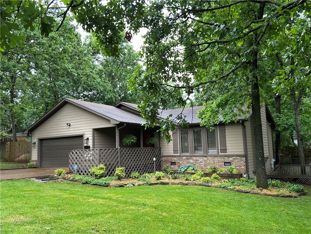 Location, location, location! Enjoy a unique rural-like setting with an abundance of natural beauty, including mature trees and a babbling creek along the West property line. This 1980s home is as solid as they come and is ready for an HGTV dreamer. Generous square footage offers plenty of room to reimagine and make it your own, with endless possibilities.