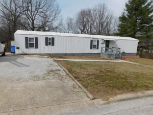 So Neat and Nice - Move in Ready 3 bedroom 2 bath mobile home permanently set up on concrete block foundation, 10 x 16 rear deck, 12 x 16 outbuilding with lights and receptacles for work shop or storage. nice stainless appliances include range, micro-hood, dishwasher and frig all new in 2018, plus most furniture also available. Home has both a central propane furnace and electric space heaters so it can function as all electric if preferred, new owner will need to obtain a propane tank as there is currently no tank on the property. Mobile is grand-fathered-in as it was the first one in the subdivision which was originally set up to be a subdivision for mobile & modular homes.