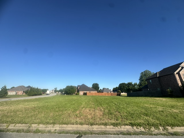 Build your dream home on this prime .36-acre corner lot in the heart of Bentonville! Ideally located next to the new Walmart Headquarters with quick and easy access to I-49, this property offers unbeatable convenience to everything Northwest Arkansas has to offer. Situated in an established neighborhood, this spacious lot combines location, accessibility, and opportunity all in one. Just minutes from shopping, dining, biking trails, entertainment, and downtown Bentonville, this is the perfect place to build. Don’t miss your chance to own a highly desirable corner lot in an exceptional location!