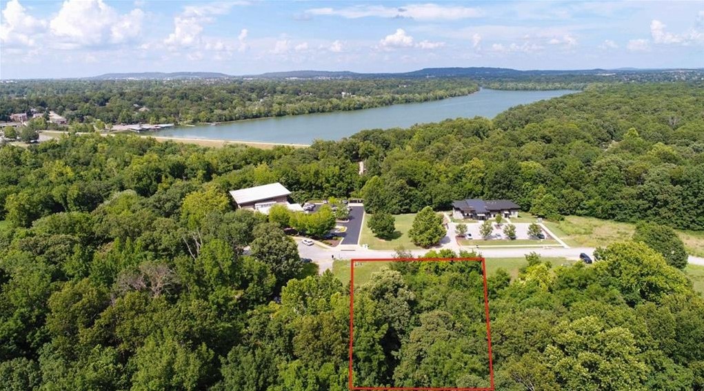Take advantage of this rare opportunity to own a .64-acre parcel in a high-visibility location near the intersection of 71B and Zion Road. Situated in a rapidly growing area with strong traffic flow and easy access to major roads, this site offers outstanding potential for a new office building or a custom build-to-suit project. Whether you're an investor, developer, or business owner, this property provides the flexibility and exposure needed to bring your vision to life. Zoned for commercial use with utilities nearby. Don’t miss out on this strategic location with endless possibilities.