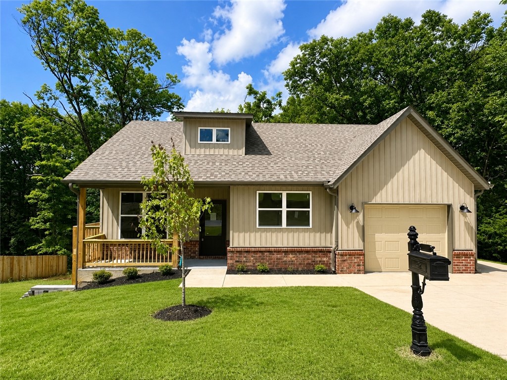 Don't let the size fool you—this newly built home is packed with high-end finishes and thoughtful design choices that maximize both function and style. Featuring quartz countertops, luxury vinyl plank flooring throughout, and a bright, open-concept layout, the home offers comfortable everyday living with a polished, modern aesthetic. The spacious kitchen island provides plenty of room for meal prep, entertaining, and additional seating, making it the centerpiece of the home. A one-car garage adds practical storage and convenience, while the location places you just minutes from outdoor adventure, including the Back 40 Trail. Whether you're searching for a low-maintenance primary residence, a first-time home purchase, or an investment opportunity, this property offers exceptional quality and value in a manageable footprint.