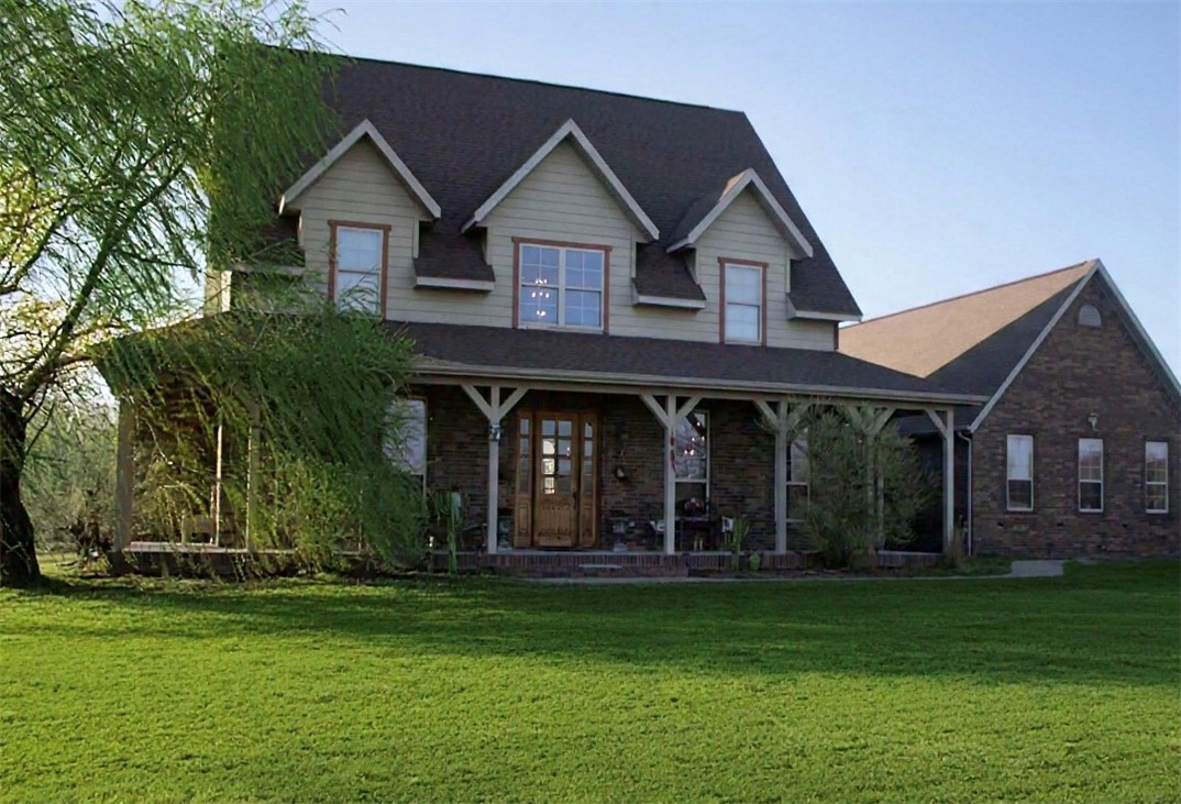 Luxury Country Estate on 34AC +/-! Experience the privacy just 10 min from XNA Airport. This impressive home offers 4BR/5BA, incl a Jack & Jill bath, plus a media room, sunroom, office, & formal dining room. Updated features incl flooring & newer roof (2020). The kitchen has a commercial-grade gas cooktop, vent hood, 2 ovens, 2 dishwashers, & granite counters. The inground pool turns the back yard into a high-end resort like atmosphere. The striking curb appeal features a covered front porch, brick exterior, & mature landscaping. The fenced & usable AC is ideal for horses, livestock, hobby farming, or recreation. A large, detached shop/garage, lean-to, & expansive driveway provide ample room for all your needs. The property has both city water & a private well. Enjoy living w/ rolling hillside views & abundant wildlife all while being just minutes from NWA amenities. Rarely does a property offer this combination of luxury living, recreational opportunities, & functional AC in such a prime location.