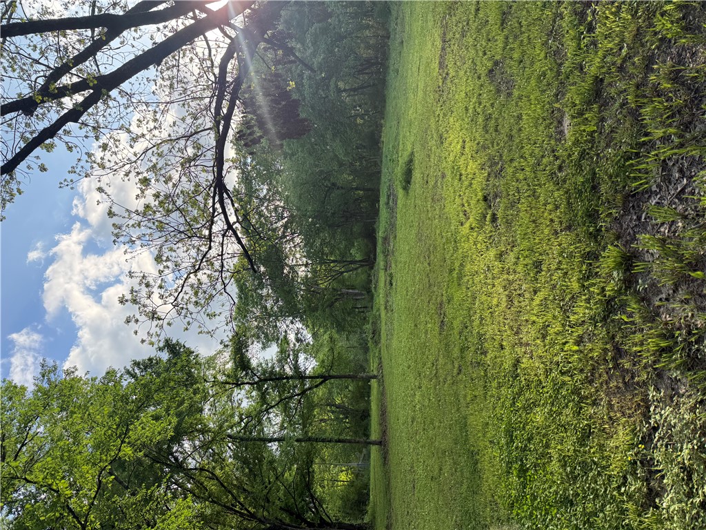Check out this property featuring 3 lots! 
The land is clear and level—perfect for building your new home. It also includes an older home that will convey with the property.  All utilities are conveniently available at the street.