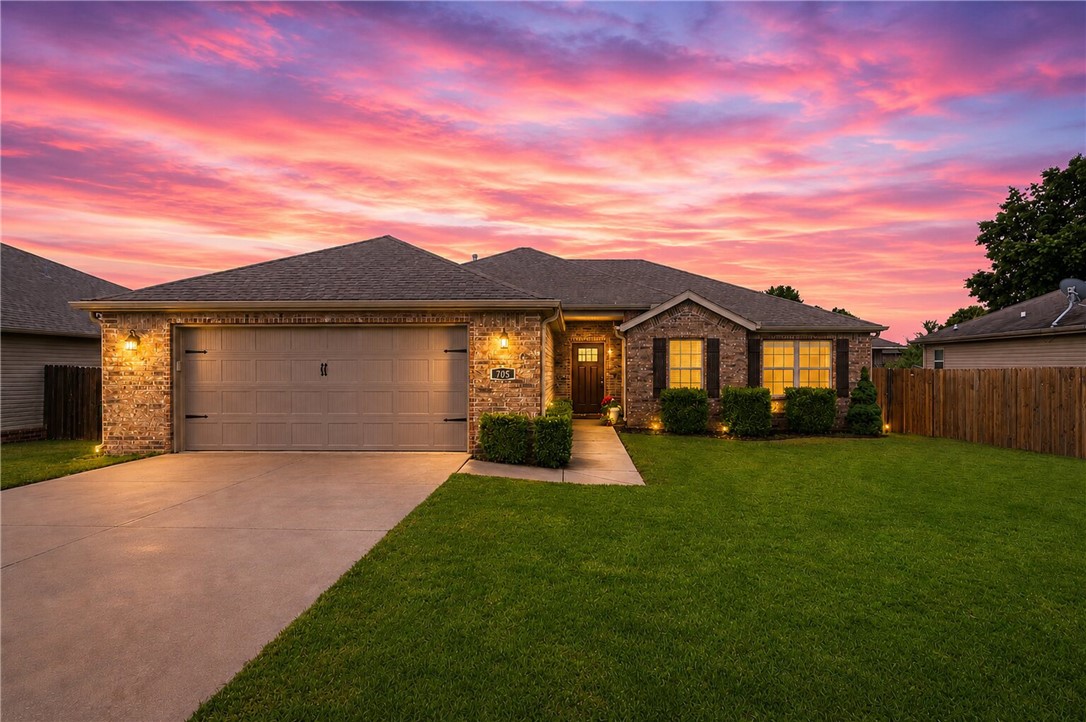 The one that got away... is back. After receiving strong interest and going under contract quickly, 705 Olivia Lane is available again. Opportunities like this don't come around often—especially in Centerton. This beautifully maintained 3-bedroom plus office, 2-bath home in the heart of Centerton! Built in 2016 and offering 1,676 sq ft, this move-in ready property combines modern finishes with comfortable everyday living. Step inside and enjoy the open feel created by tall ceilings, oversized windows, and abundant natural light throughout. The spacious eat-in kitchen features quartz countertops, generous prep space, and appliances including an electric range, dishwasher, and microwave vent hood—perfect for everyday living and entertaining. The primary suite offers a relaxing retreat with walk-in closets and functional design. Additional features include ceiling fans, blinds throughout, attached 2-car garage with garage door openers, and convenient keyless entry. Screened-in deck enjoy the large fenced in backyard.
