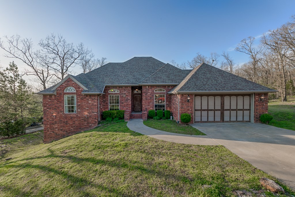 Amazing and beautiful custom built home with 3.04 acres, country feel, yet close to schools and city limits. Welcoming entryway with coat closet, high ceilings with crown molding, window trim, gas fireplace,tons of natural light, formal dining room, ceramic tile counters, beautiful cabinets, bonus room/media room, master bedroom has crown molding, whirlpool, stand up shower, huge walk-in closet with lots of built-ins, double vanity. You will love the covered back porch with amazing views of back yard, heated and cool walk-out basement that coud be used as mother-in-law quarters, game room, or hobby room.