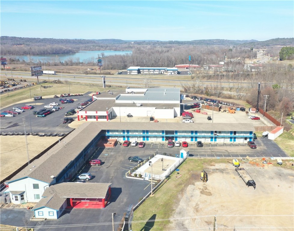 Excellent investment opportunity! This well-maintained 52 room motel is ideally situated just off the interstate, offering exceptional visibility and convenient access for travelers. The property features a spacious on-site manager’s apartment, allowing for efficient, hands-on operation. An additional adjoining lot is included, perfect for future development such as a fast-food chain, convenience store, or other highway commercial venture. With steady traffic flow, ample parking, and strong area demographics, this property provides significant upside potential for both hospitality and retail investors.