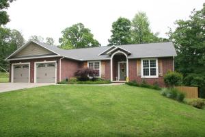 Located in a peaceful neighborhood on 2.24 ac. Home features: main level-3 BR, 21/2 BA, split bedroom floor plan, hardwood floors, partial covered deck with hot tub. Basement features: large family room - plumbed for kitchenette, one bedroom, full bath & a study/office which could be used as a 5th bedroom, workshop with garage door & plenty of storage, covered patio. Privacy fenced backyard.