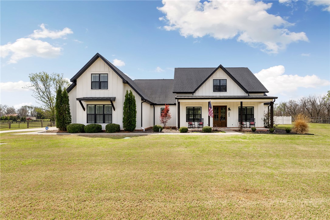Custom-built estate on 2.04 acres in East Fayetteville featuring a pool and two separate dwellings for versatile use. The main residence offers 3 bedrooms on the main level plus a bonus room upstairs. Spacious open living area with ample dining space designed for both everyday living and entertaining. The detatched pool house spans approximately 1,700 sq ft with a fully equipped kitchen, living area, 2 bedrooms, 2 baths and an additional 1,000 sq ft of shop space complete with W/D hookups and a full bay door. Ideal property for guests, multigenerational living or a private retreat. Enjoy an 18x36 heated sports pool, covered porches, fully fenced back yard for a rare blend of privacy and versatility minutes from the University of Arkansas.