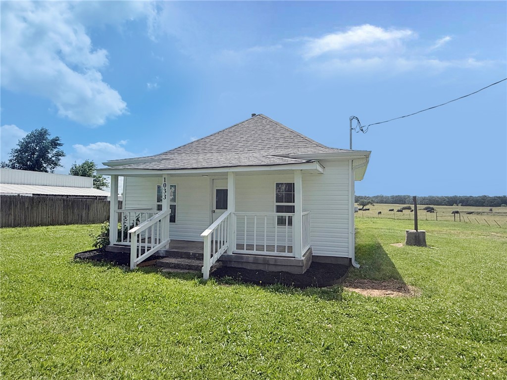 A vintage cottage home located on a level half acre that has been updated to move in ready! Updates include roof, siding, flooring, lighting, paint and kitchen. 2 mini split AC's to cool and a wall gas furnace in the living room to heat. Open pasture and original storm cellar on the property. This is a Fannie Mae Homepath property.
